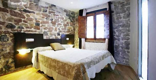 Habitación con jacuzzi en casa rural asturias de la casa rural Casa Aguas del Sella