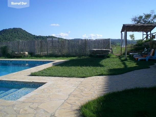 Zona piscina  de la casa rural Casa Rural " Los Cuatro Olivos"