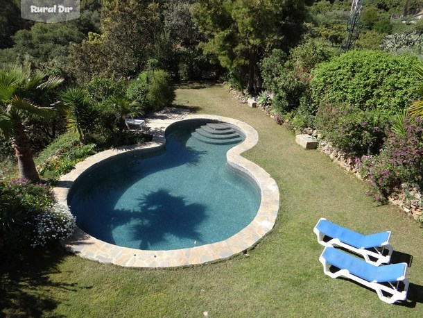 Piscina y jardin de la casa rural La Bellota Apartamento con Jacuzzi