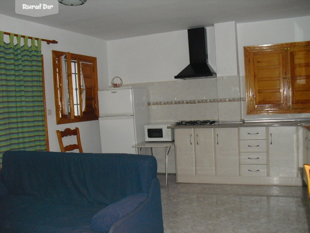 salón cocinaEscribe la descripción aquí de la casa rural Apartamento torvizcon