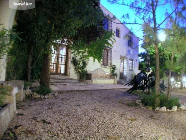 Fachada del Jardin de la casa rural Casa Rural Masia Los Pasos