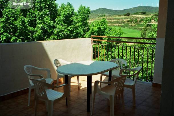  Terraza con barbacoa de la casa rural Casa villa martin